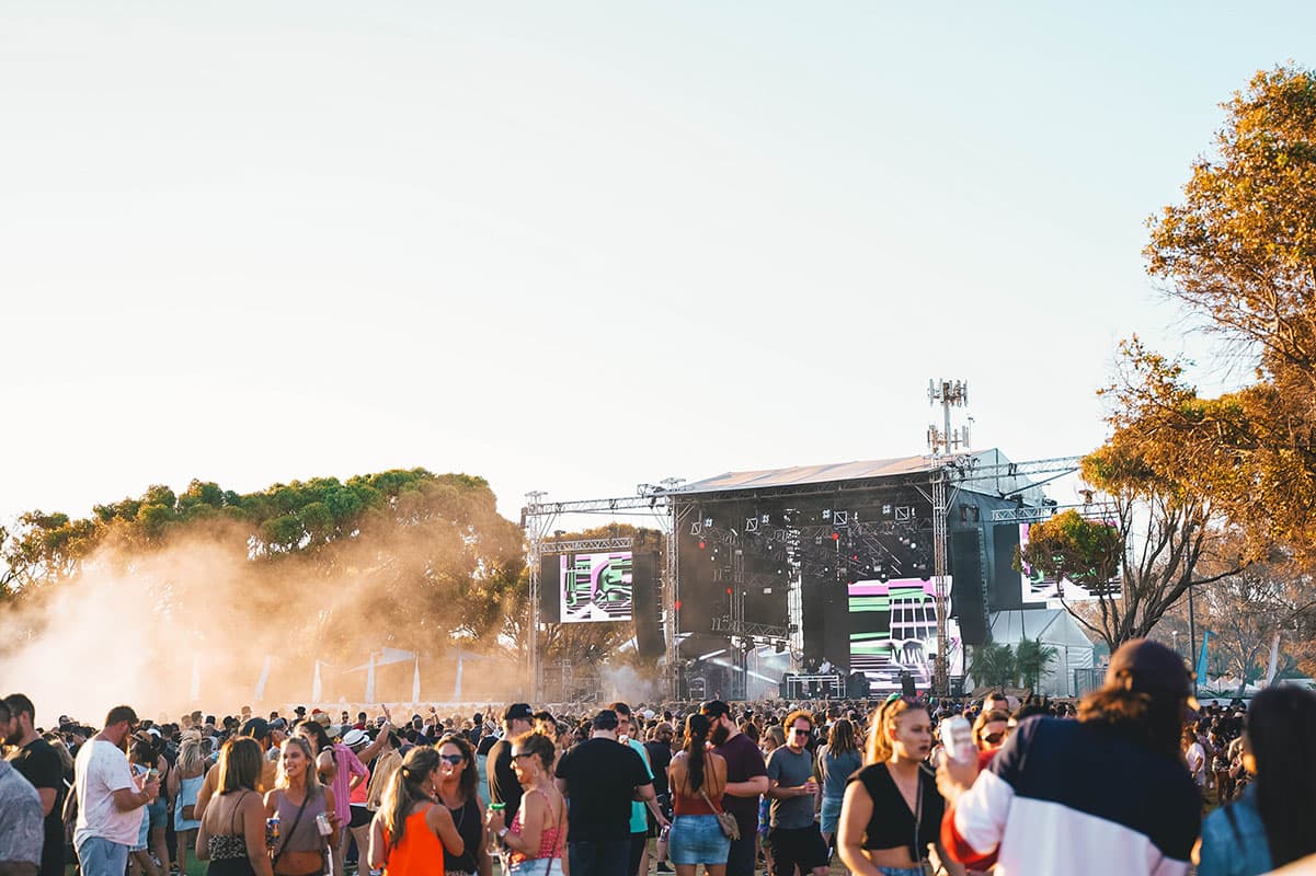 Castaway festival crowd at sunset
